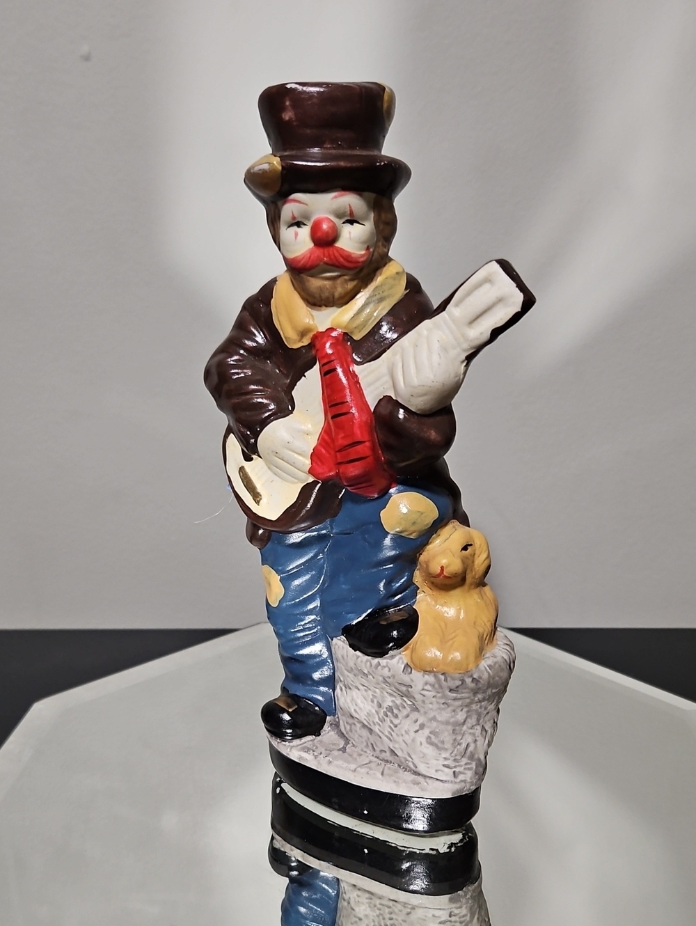 Source Unknown Ceramic Clown Musician Figurine in Brown, Blue, Red, Yellow